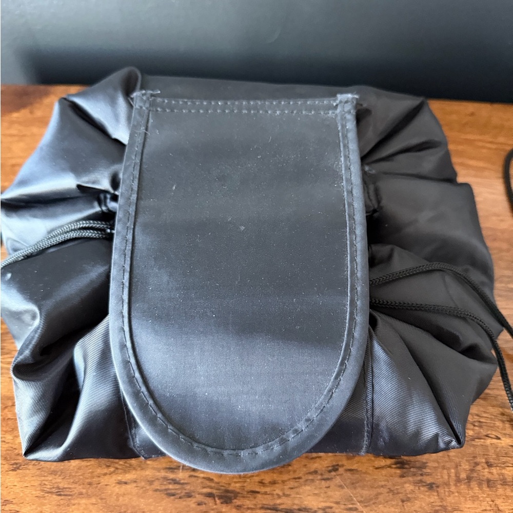 Lay Flat Black Drawstring Makeup Bag - image 1